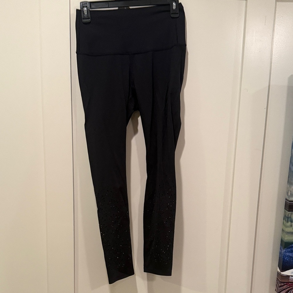 CALIA by Carrie Underwood Black Activewear Leggings with peek a boo holes at the